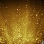 Fairy dust flying in gold light rays. Computer generated abstract raster illustration