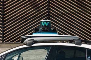top of Waymo car, showing equipment on roof