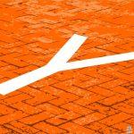 Y Combinator logo on a brick walk