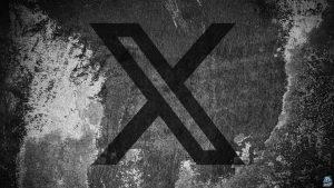 X (formerly Twitter) logo on a cracked wall