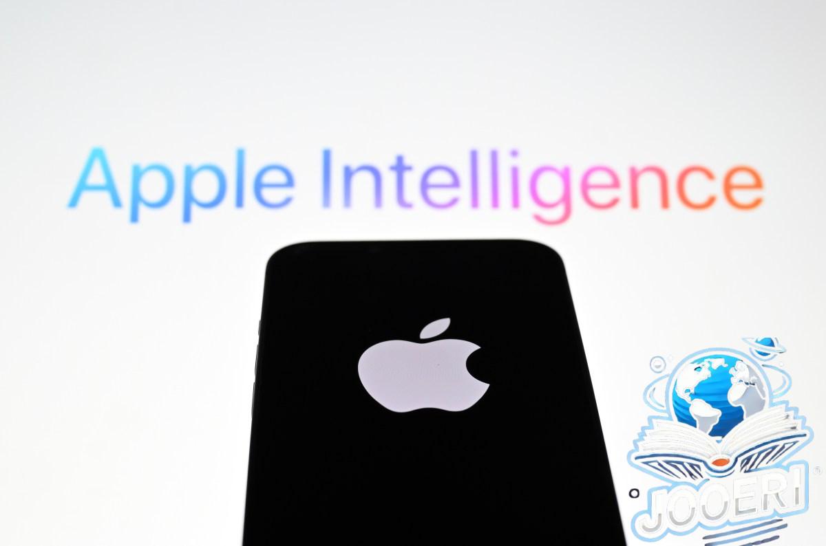 In this photo illustration, the 'Apple' logo is displayed on a mobile phone screen in front of a computer screen displaying Apple Intelligence logo.