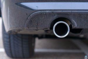 Low angle view of an exhaust pipe on a car.