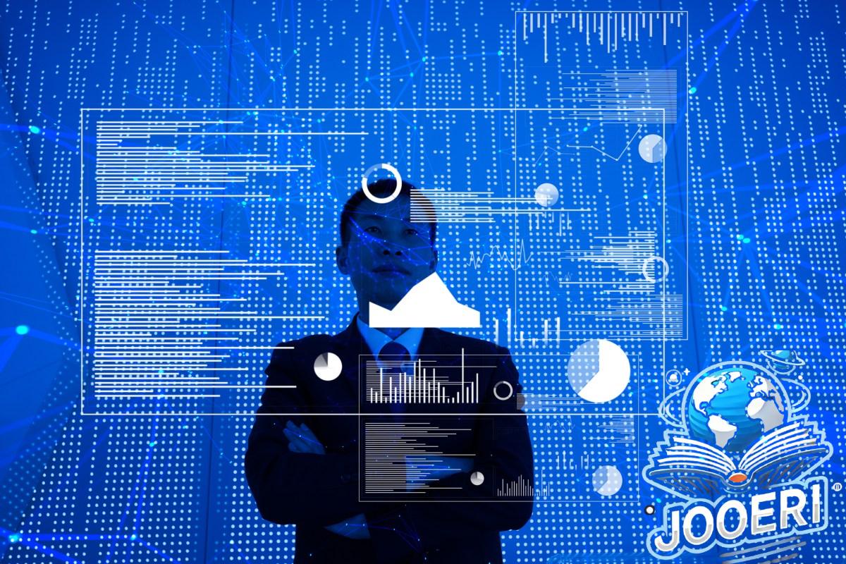 Man standing in front of big blue screen with charts and data spread out before him.