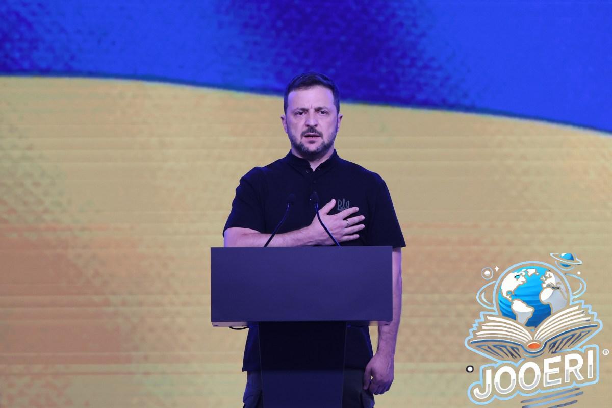 Volodymyr Zelenskyi, President of Ukraine, holds his hand over his heart during the performance of the national anthem of Ukraine at the VII Annual International Veterans Forum ‘Ukraine. Veterans. Unity’ on August 22, 2024 in Kyiv, Ukraine.