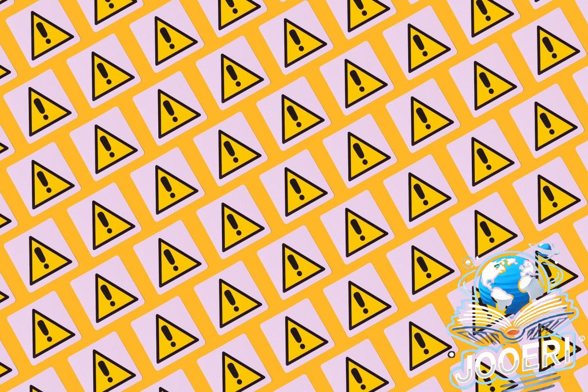 yellow warning symbols with exclamation points on a patterned background