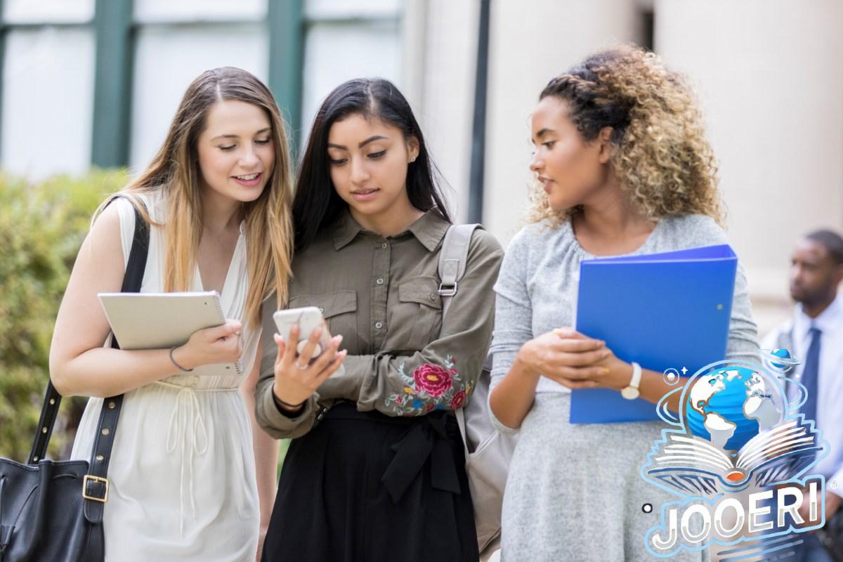 College students reading text on smartphone